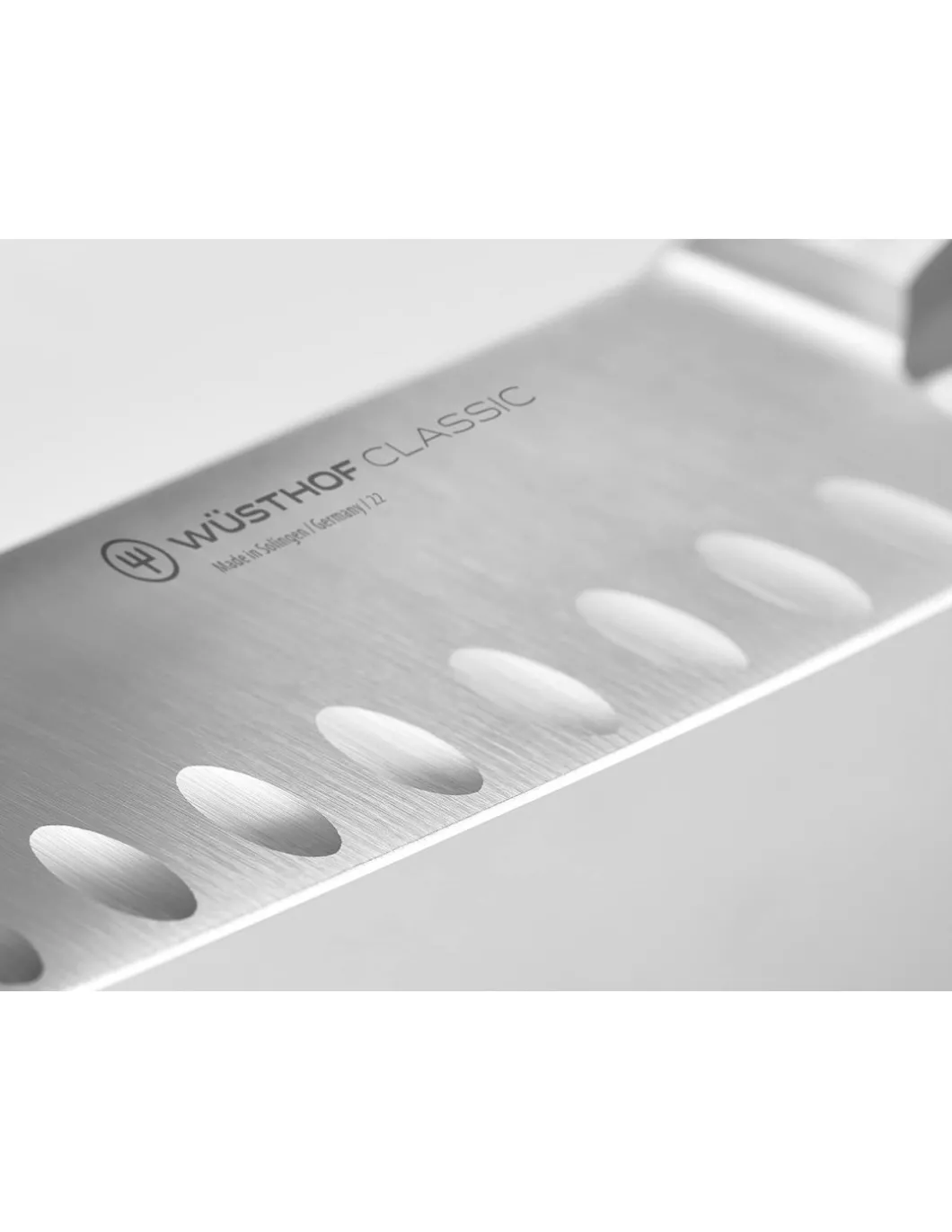 Coltello Santoku Alveolato Classic Wusthof Pink Himalayan Salt